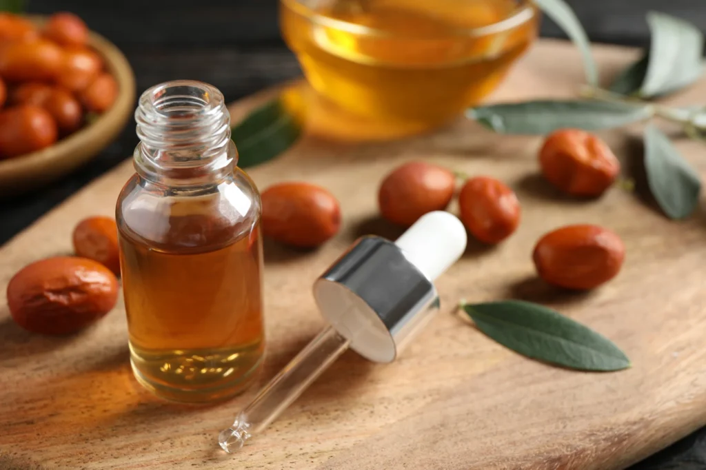 hoe to use jojoba oil for frizzy hair